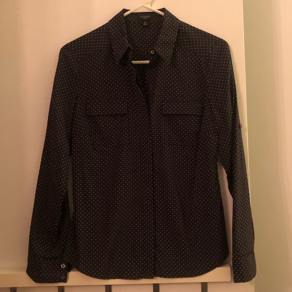 Petite navy polka dot button down top!
